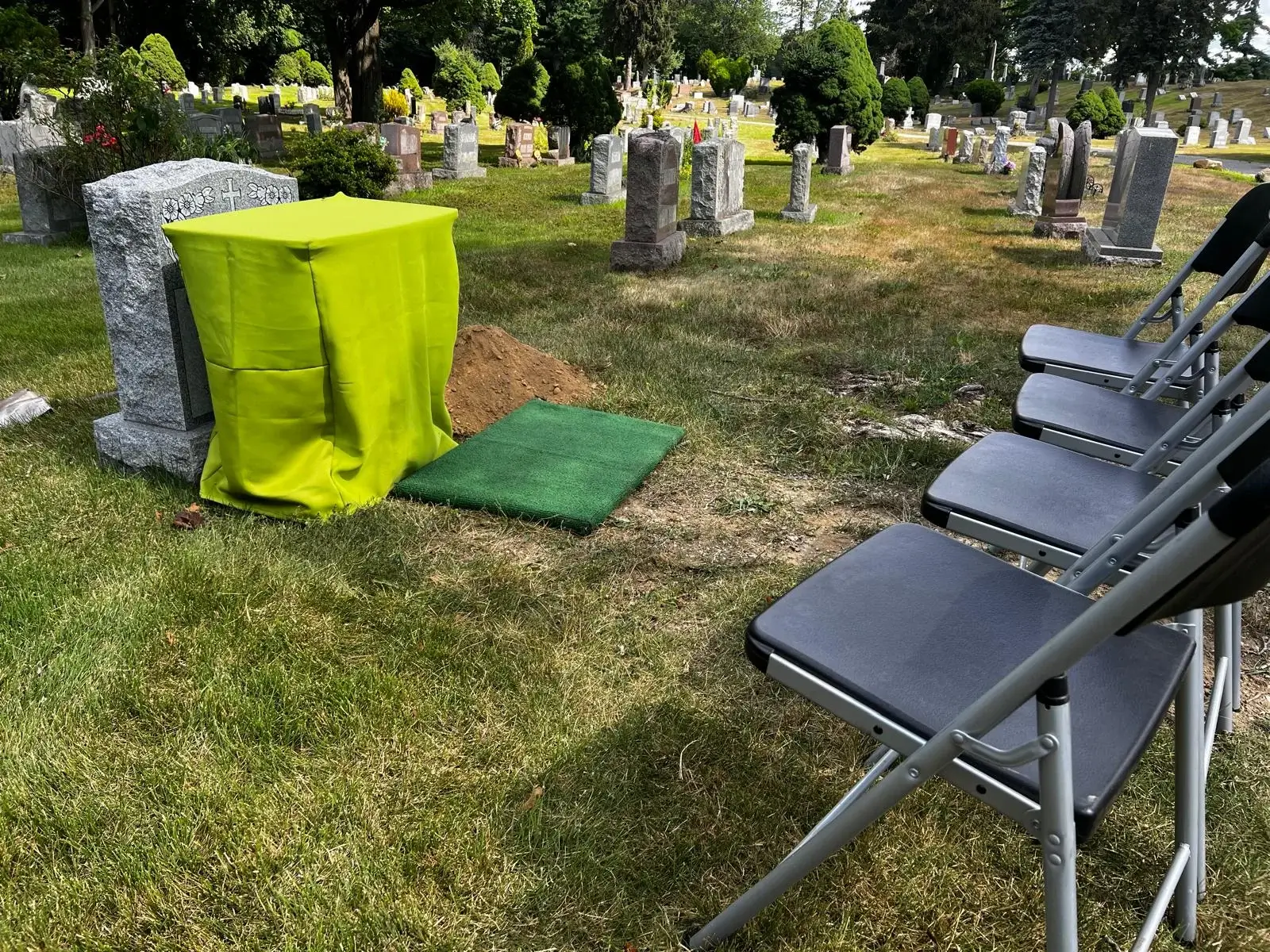 Professional cemetery burial services in Connecticut provided by M&G Landscaping & Lawn Care LLC, including burial preparation and site setup.
