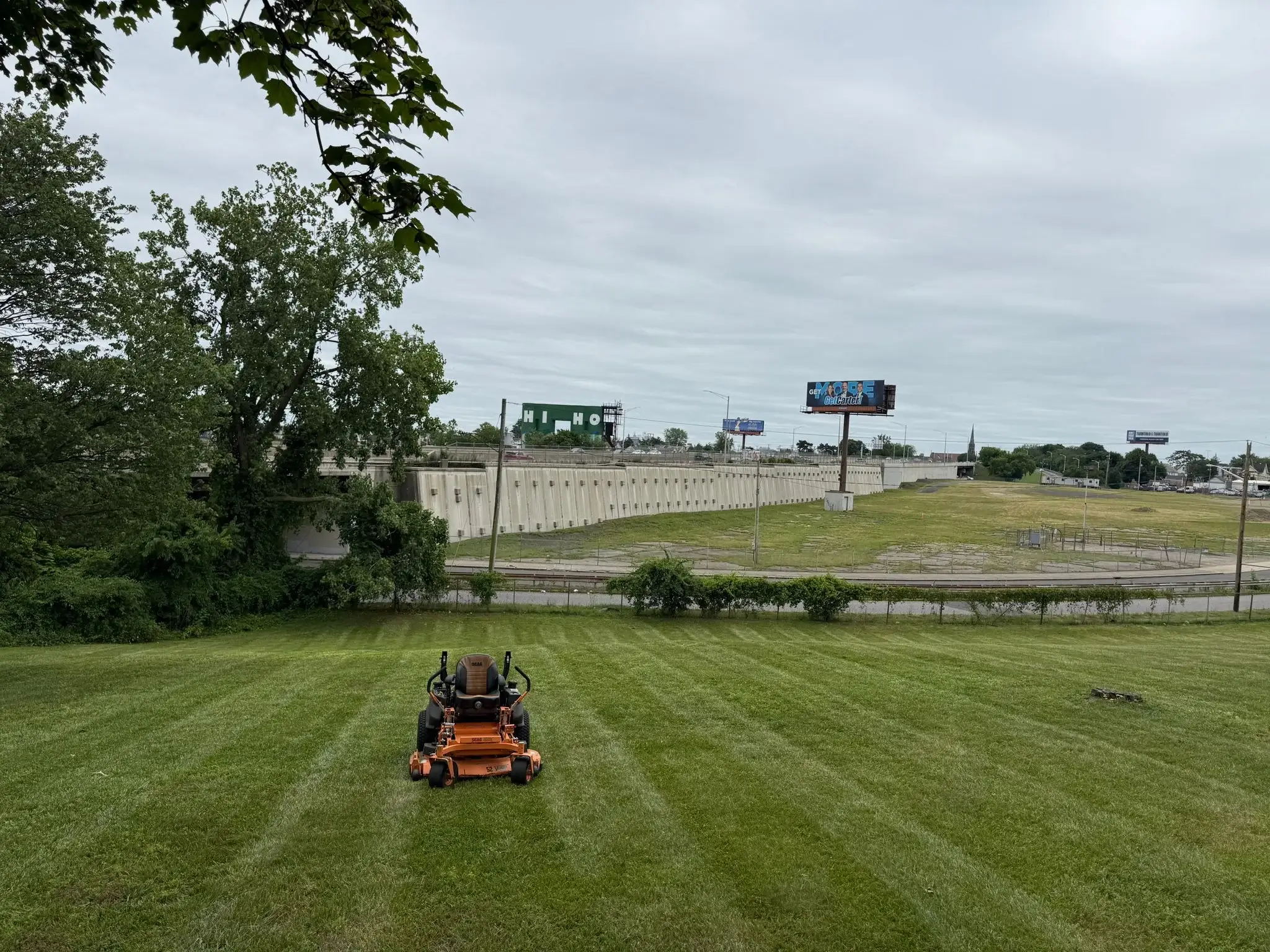 Commercial lawn care service with freshly mowed grass and professional striping in Connecticut.