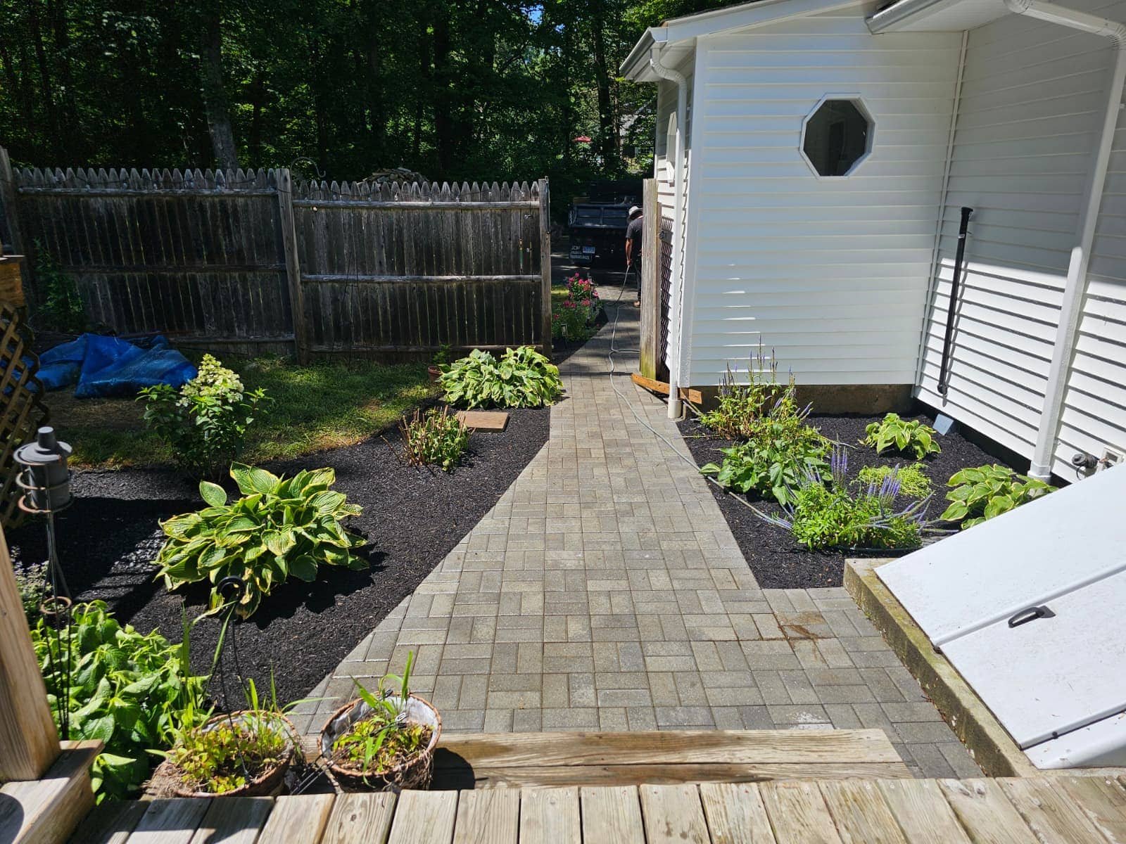 Planting, mulching, and stone walkway installation by M&G Landscaping & Lawn Care LLC in Fairfield, CT