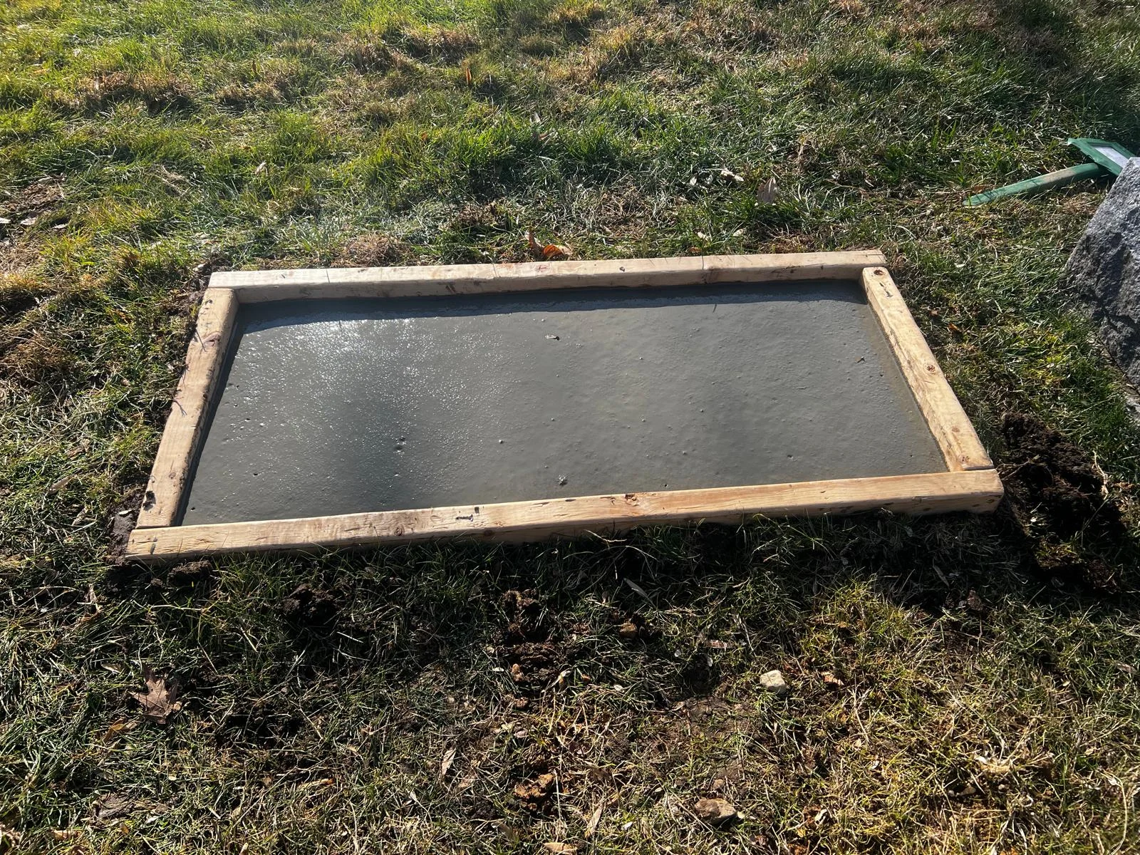 Concrete grave base installation in Connecticut by M&G Landscaping & Lawn Care LLC