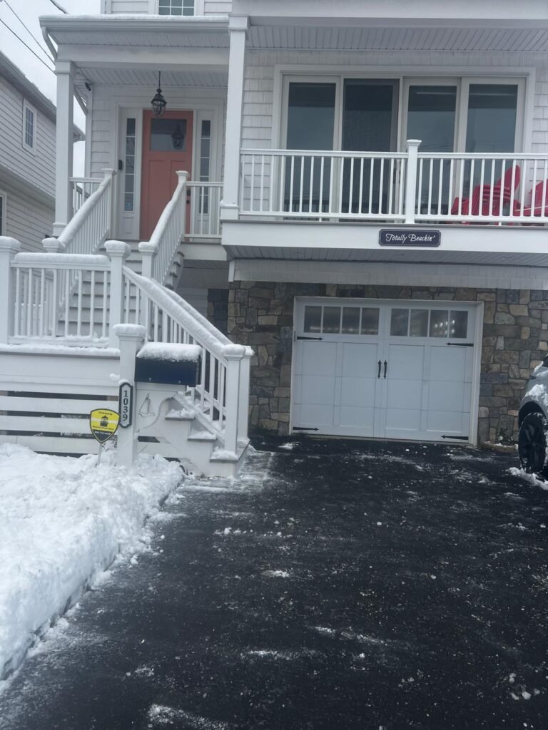 Residential driveway and front entrance snow removal by M&G Landscaping & Lawn Care LLC in Fairfield, CT